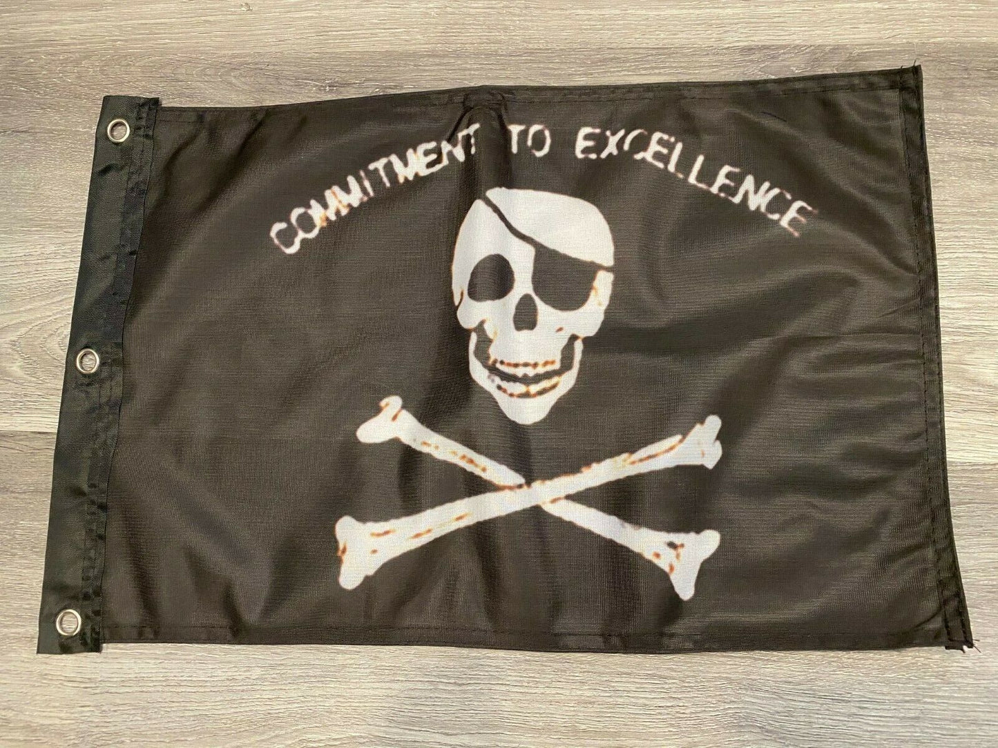 Pirate Commitment to Excellence Flag 12" x 18" Poly21